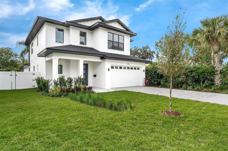 Front exterior of a new home in , Orlando, FL, highlighting curb appeal (Image 27).