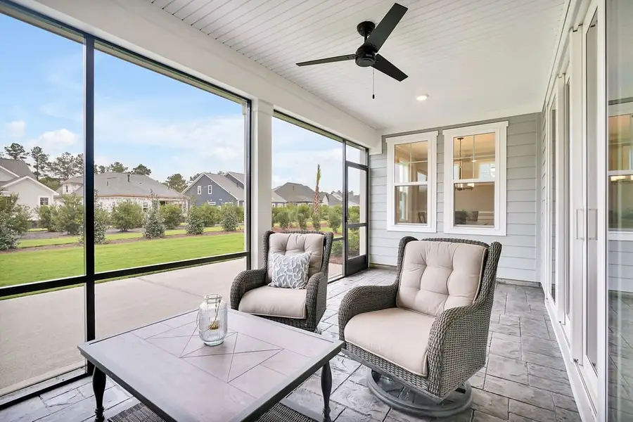 Exterior details and patio area of a home in Brunswick Forest, Leland (Image 2).