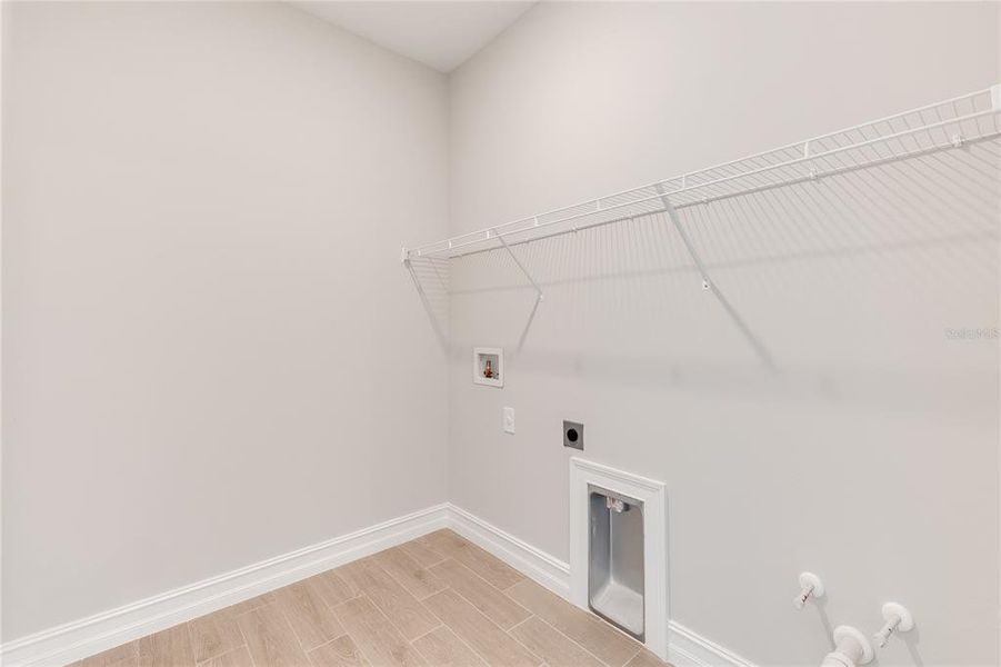 Spacious, unfurnished interior of a new home in Coral Lakes - Tradition & Express, Punta Gorda (Image 15).