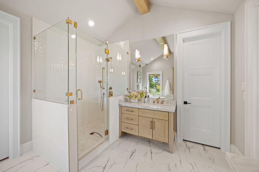 2nd vanity & glass encased walk-in showers on the other side of the Suite.