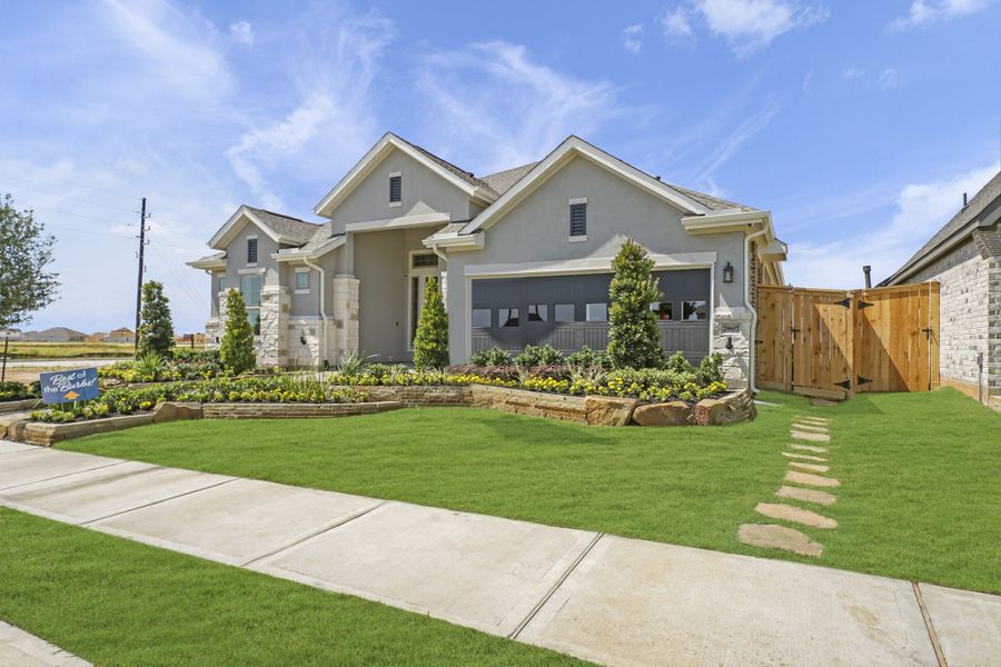 Front exterior of a new home in Jordan Ranch, Fulshear, TX, highlighting curb appeal (Image 23).