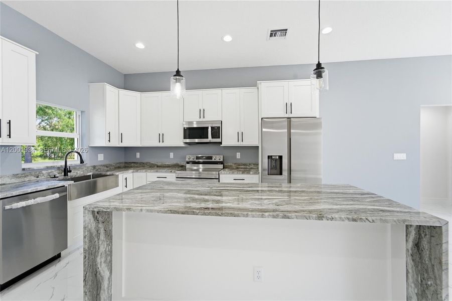 Furnished interior view inside a new home in , Port St. Lucie (Image 12).