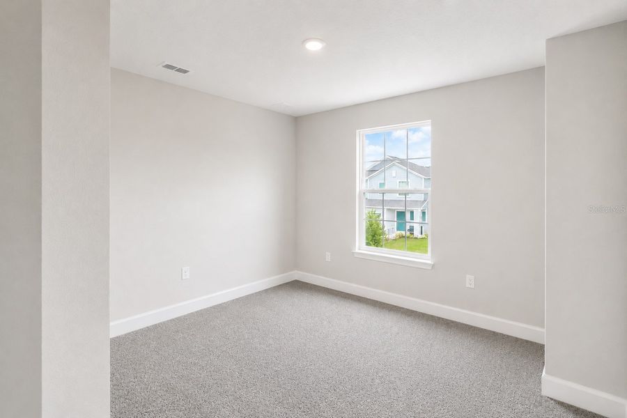 Spacious, unfurnished interior of a new home in Harmony Central, St. Cloud (Image 24).