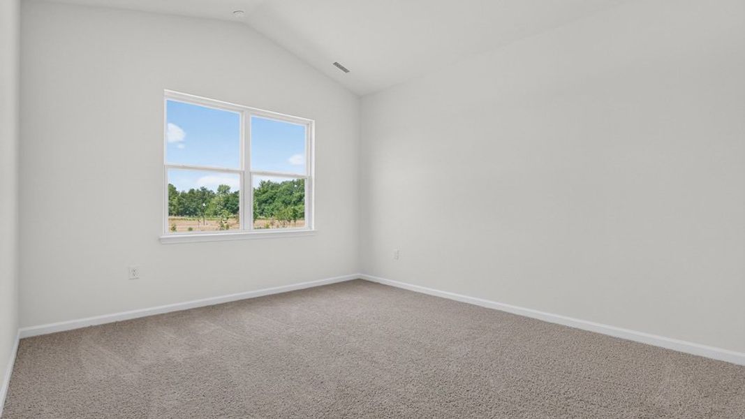 Spacious, unfurnished interior of a new home in The Grove at Matthews Landing, Fuquay Varina (Image 27).