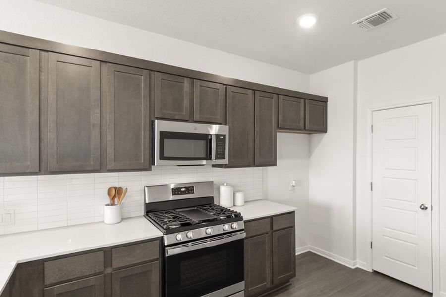 Representative furnished interior of a home built from the Ash by Pacesetter Homes in Blanco Vista, San Marcos (Image 24).