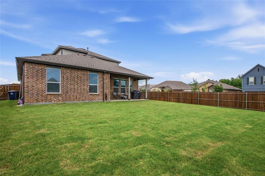 Exterior details and patio area of a home in , Denton (Image 3).