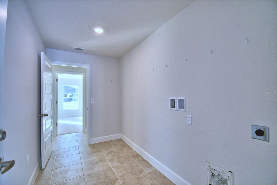 Spacious, unfurnished interior of a new home in Cadence Crossing, Auburndale (Image 20).