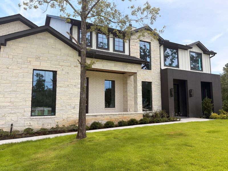Front exterior of a new home in , Montgomery, TX, highlighting curb appeal (Image 17).