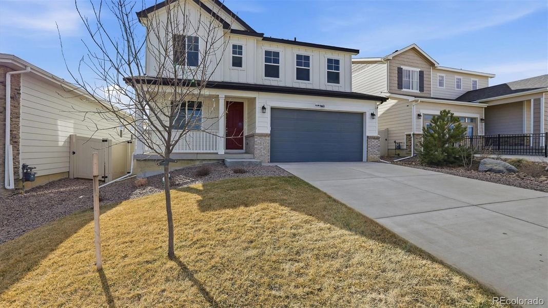 Situated on a low-maintenance xeriscaped lot with 2-car attached garage.
