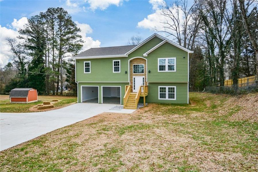 Front exterior of a new home in , Hiram, GA, highlighting curb appeal (Image 18). Front exterior of a new home in , Hiram, GA, highlighting curb appeal (Image 18).