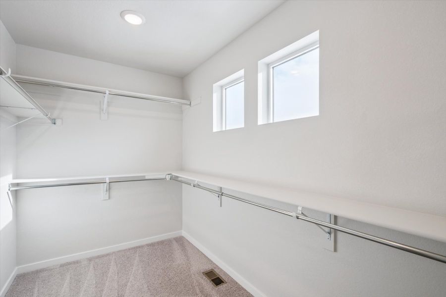 A white room with a staircase. A white room with a staircase.