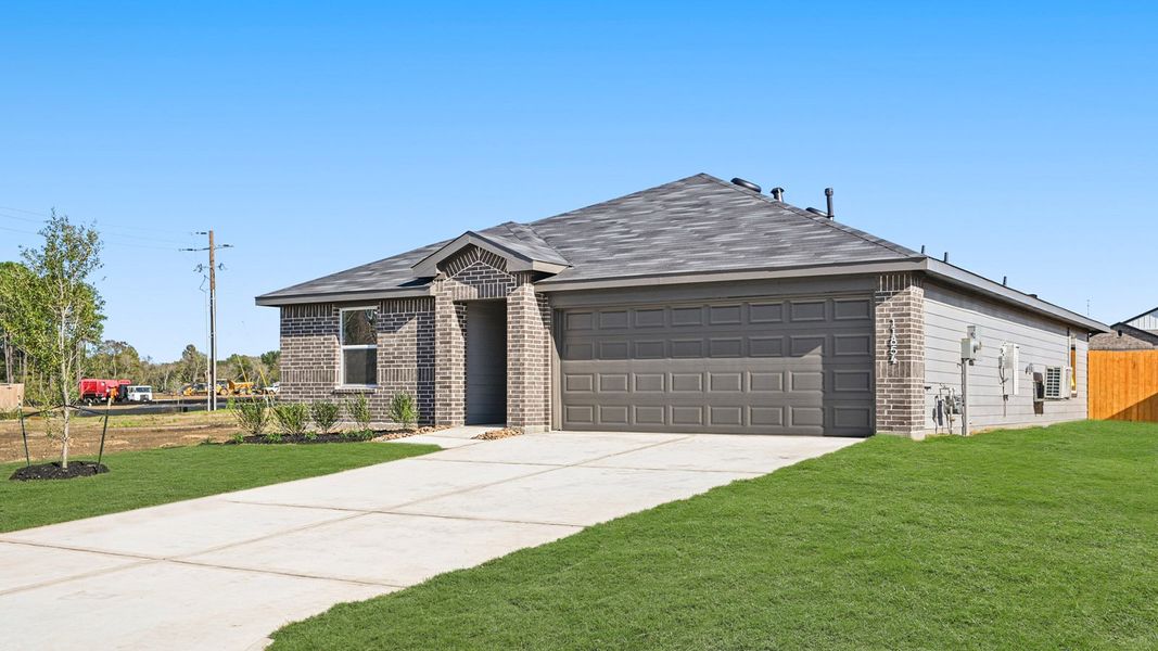Representative exterior photo of a completed home built from the Anderson by D.R. Horton in Lexington Heights, Willis, TX (Image 17). Representative exterior photo of a completed home built from the Anderson by D.R. Horton in Lexington Heights, Willis, TX (Image 17).
