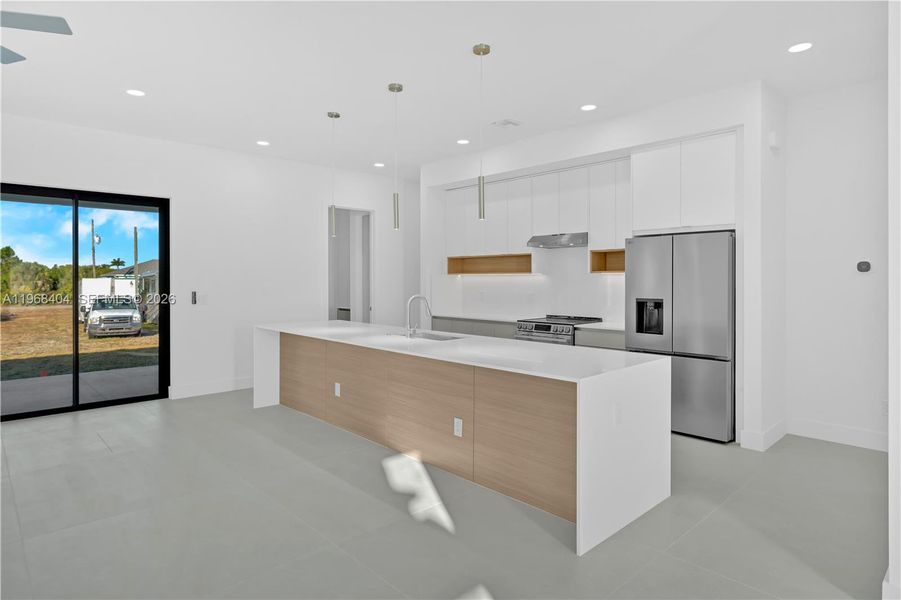 Furnished interior view inside a new home in , Port Charlotte (Image 11).