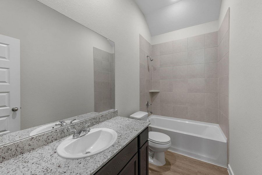 Furnished interior view inside a new home in Lexington Heights, Willis (Image 8).