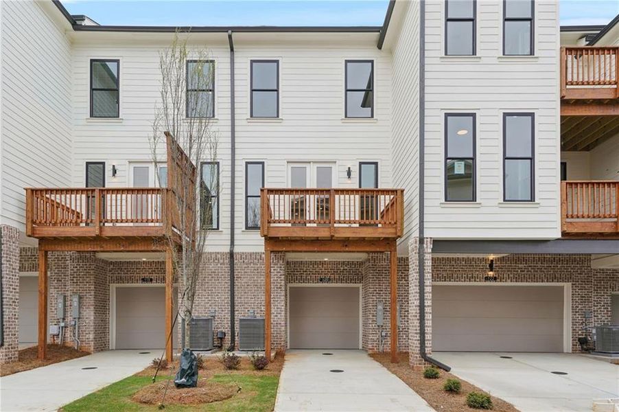 Exterior details and patio area of a home in IveyBrooke, Alpharetta (Image 13).