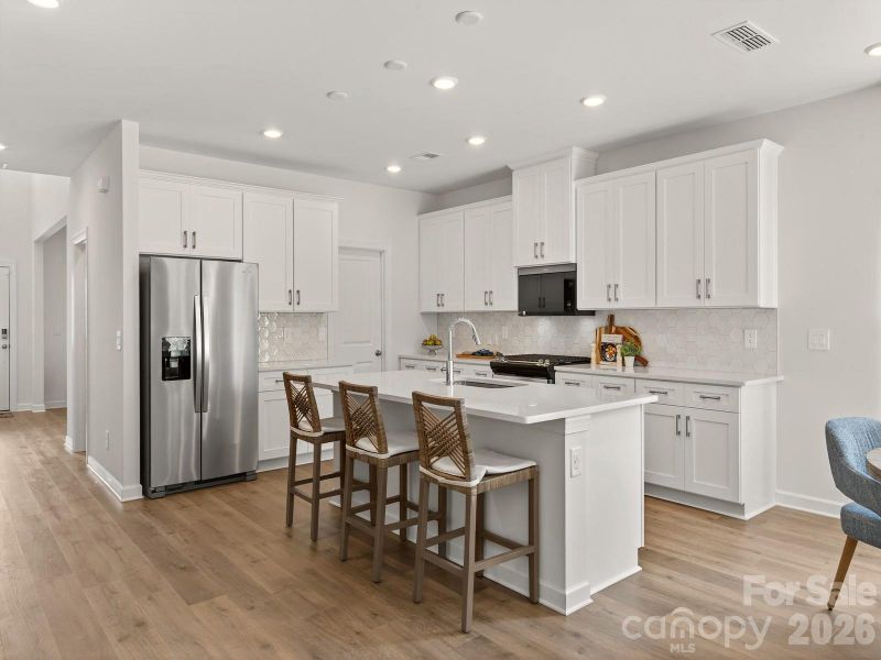 Photo is not of the actual home, but is an inspirational photo of builder’s model home and may depict options, furnishings, and/or decorator features that are not included