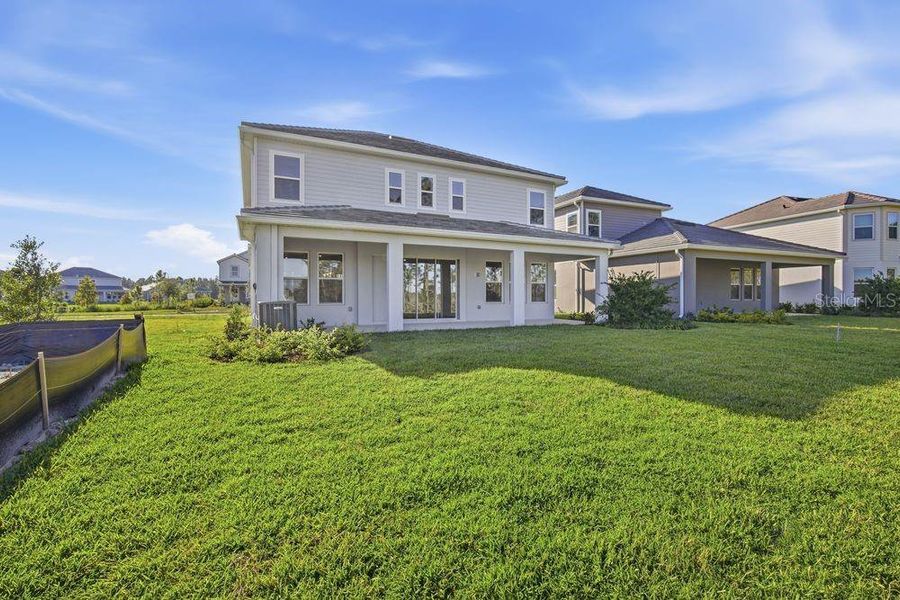 Exterior details and patio area of a home in Hammock at Two Rivers, Zephyrhills (Image 3). Exterior details and patio area of a home in Hammock at Two Rivers, Zephyrhills (Image 3).