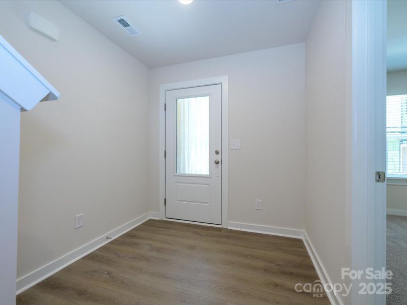 Spacious, unfurnished interior of a new home in Central Living at Craig, Charlotte (Image 25).