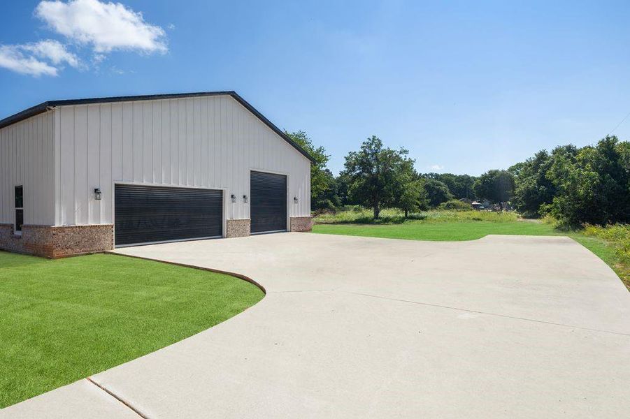 Front exterior of a new home in , Rhome, TX, highlighting curb appeal (Image 1). Front exterior of a new home in , Rhome, TX, highlighting curb appeal (Image 1).