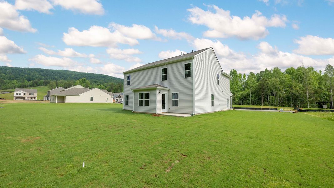 Front exterior of a new home in Price's Crossing, LaFayette, GA, highlighting curb appeal (Image 24).