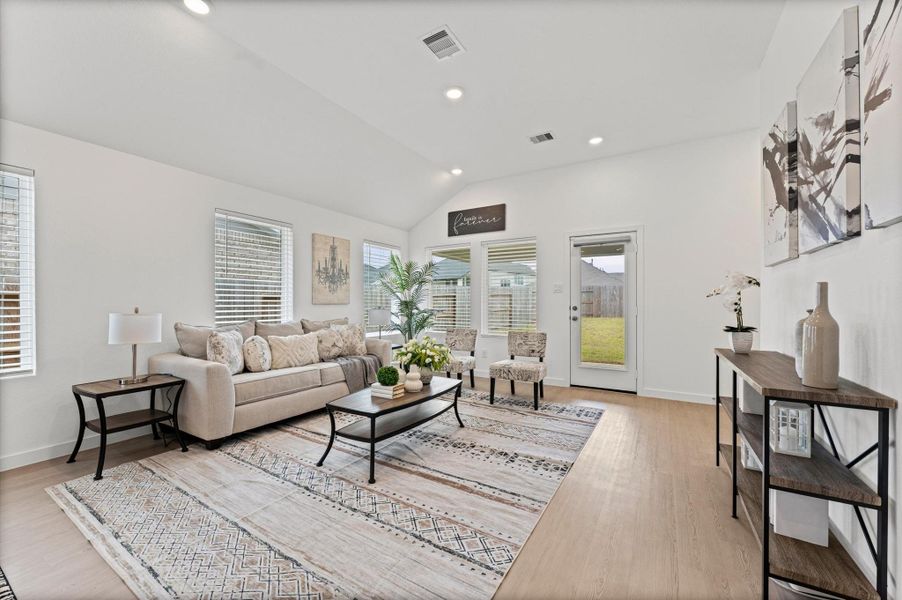Family room with access to covered patio and lots of natural sunlight Family room with access to covered patio and lots of natural sunlight