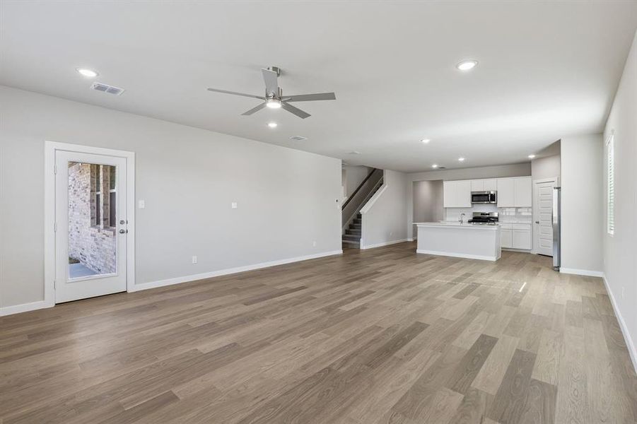 Open First Floor in the Holden home plan by Trophy Signature Homes – REPRESENTATIVE PHOTO Open First Floor in the Holden home plan by Trophy Signature Homes – REPRESENTATIVE PHOTO