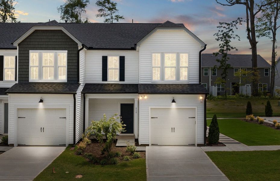Front exterior of a new home in Poets Walk, Whitsett, NC, highlighting curb appeal (Image 20).