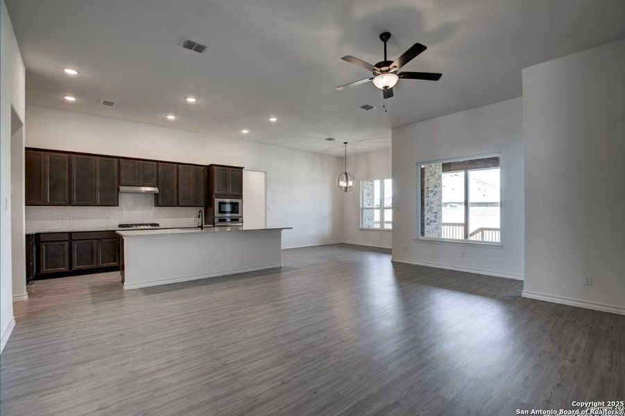 Spacious, unfurnished interior of a new home in The Reserve at Potranco Oaks, Castroville (Image 7).