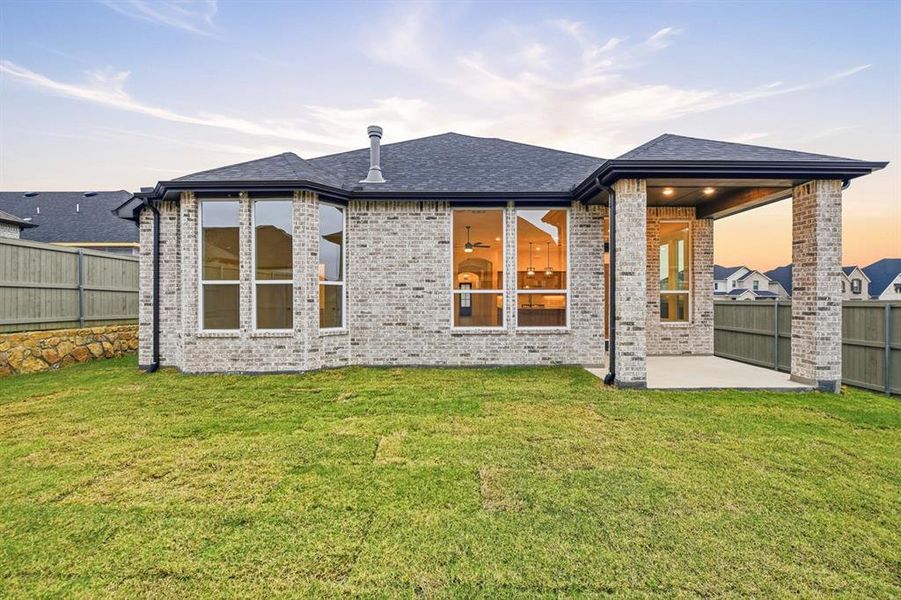 Exterior details and patio area of a home in Pecan Square: 50ft. lots, Northlake (Image 19).