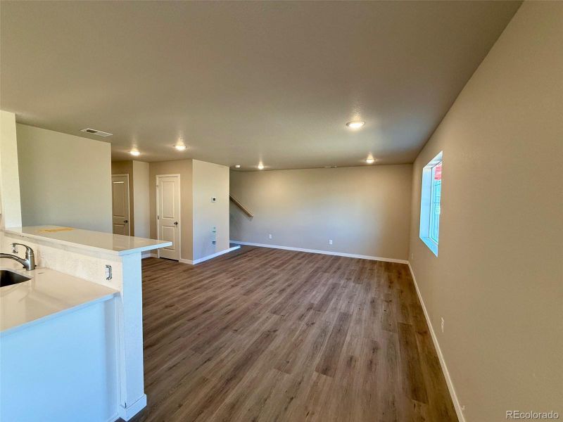 Spacious, unfurnished interior of a new home in Sky Ranch - Highland Collection, Watkins (Image 15).