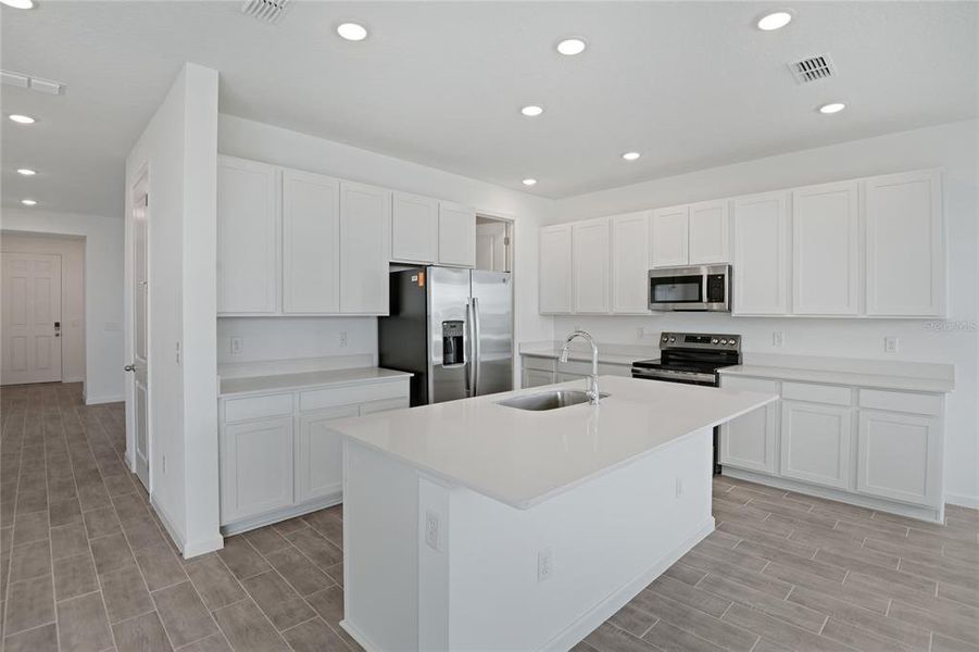 Furnished interior view inside a new home in Seasons at Bella Vista, Dundee (Image 7).