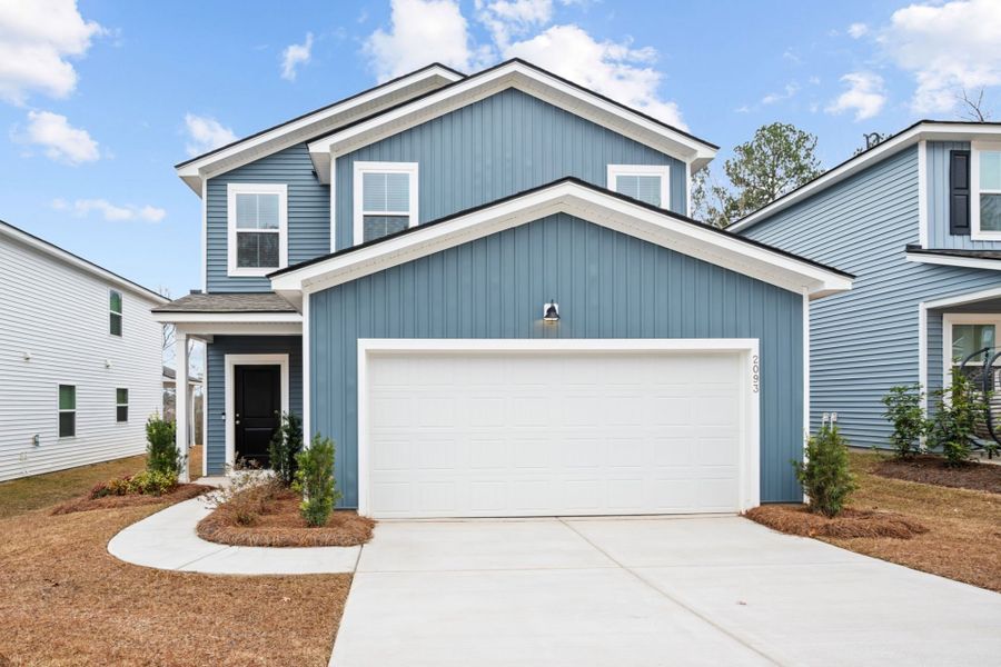 Front exterior of a new home in Grand Arbor, Blythewood, SC, highlighting curb appeal (Image 15).