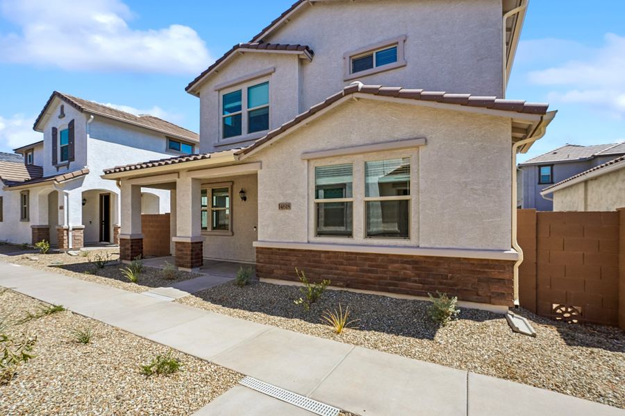 Exterior details and patio area of a home in Rancho Mercado, Surprise (Image 24).