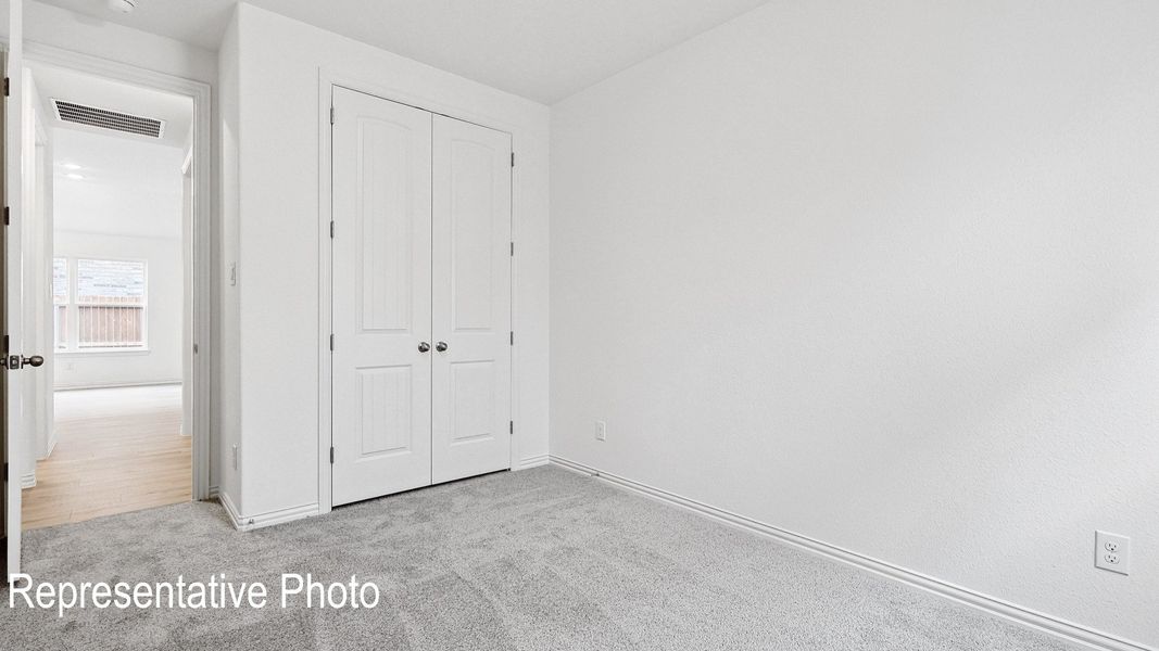 Furnished interior view inside a new home in Green Meadows Premier, Celina (Image 17).