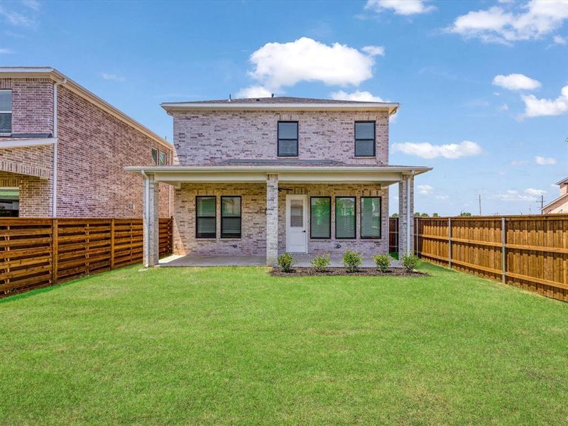 Front exterior of a new home in Royal Court, Little Elm, TX, highlighting curb appeal (Image 22). Front exterior of a new home in Royal Court, Little Elm, TX, highlighting curb appeal (Image 22).