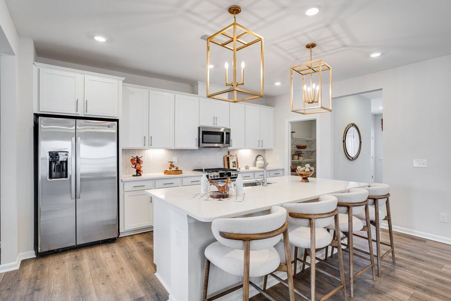 Representative furnished interior of a home built from the Charleston by Taylor Morrison in Silverstone Terraces, Knightdale (Image 3).