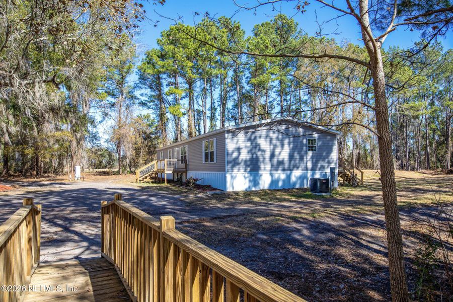 Exterior details and patio area of a home in , Lake Butler (Image 23).