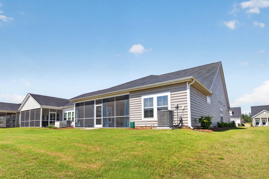 Exterior details and patio area of a home in Horizons at Summers Corner | 55+, Summerville (Image 23).