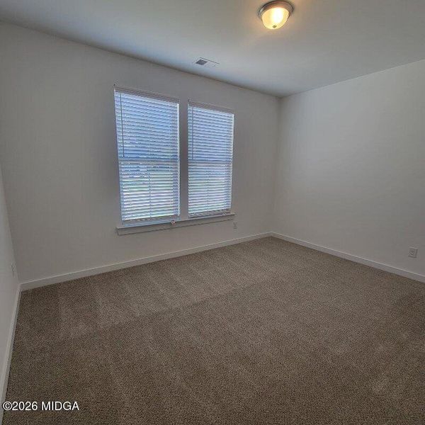 Spacious, unfurnished interior of a new home in Langston Place, Perry (Image 10).