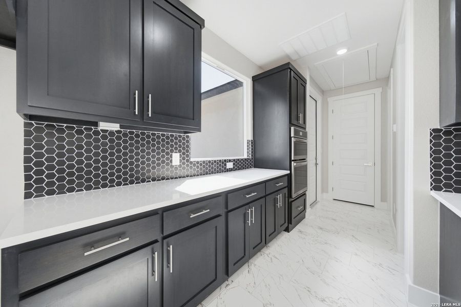 Furnished interior view inside a new home in , Mico (Image 16).