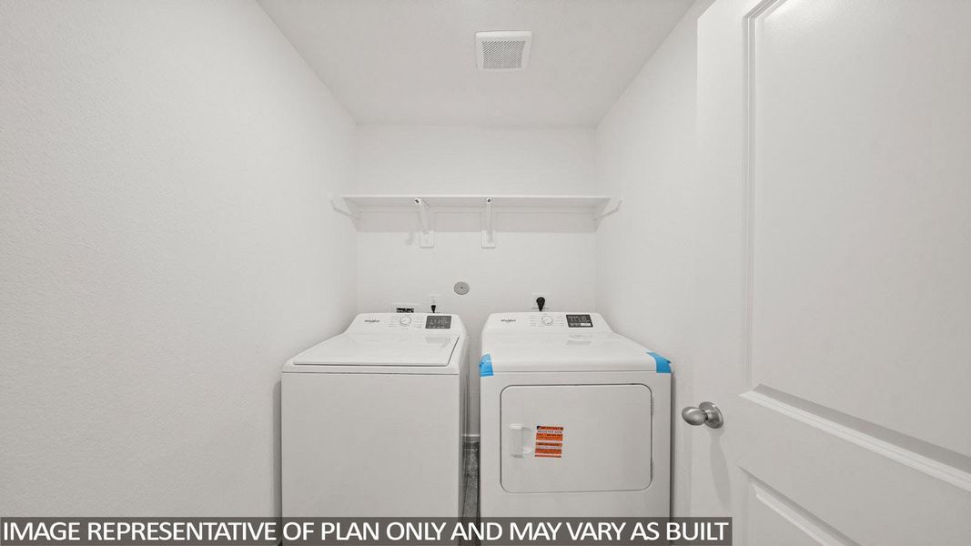 A dedicated utility space with white walls and a functional shelf above laundry appliances.