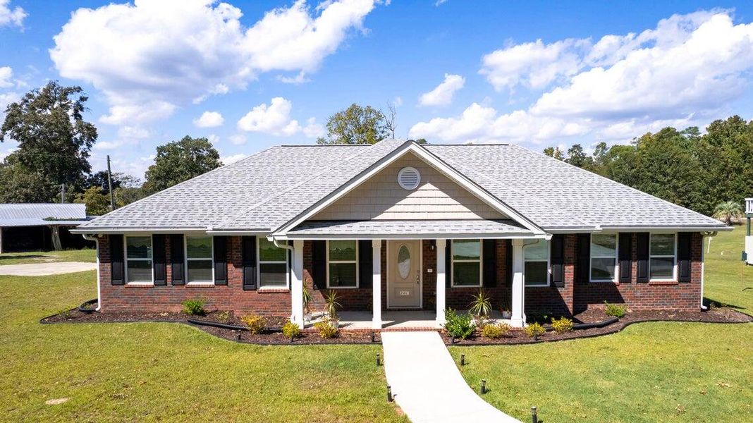 Front exterior of a new home in , Manning, SC, highlighting curb appeal (Image 22).