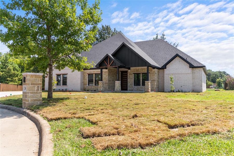 Front exterior of a new home in , Corsicana, TX, highlighting curb appeal (Image 1). Front exterior of a new home in , Corsicana, TX, highlighting curb appeal (Image 1).