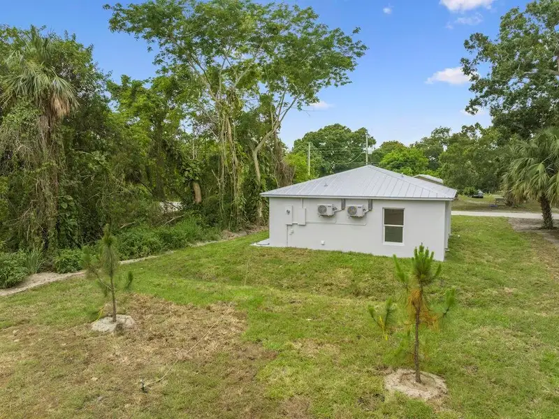 Front exterior of a new home in , Vero Beach, FL, highlighting curb appeal (Image 1). Front exterior of a new home in , Vero Beach, FL, highlighting curb appeal (Image 1).