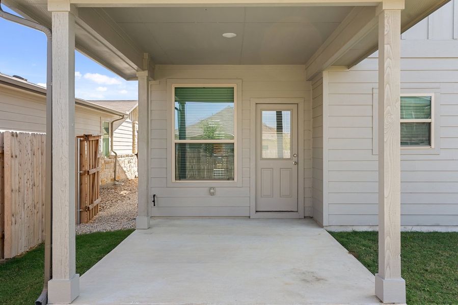 Exterior details and patio area of a home in Crosswinds, Kyle (Image 14).