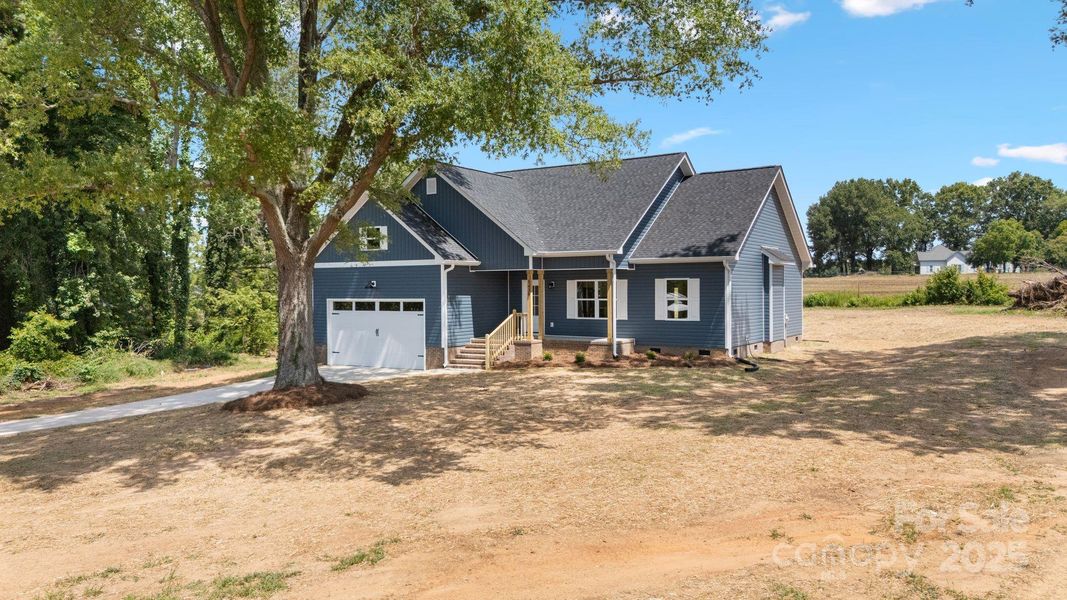 Front exterior of a new home in , Vale, NC, highlighting curb appeal (Image 22). Front exterior of a new home in , Vale, NC, highlighting curb appeal (Image 22).