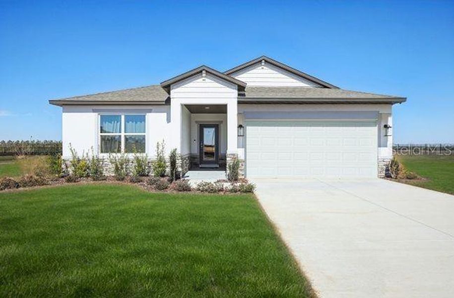 Front exterior of a new home in , Ocala, FL, highlighting curb appeal (Image 1). Front exterior of a new home in , Ocala, FL, highlighting curb appeal (Image 1).