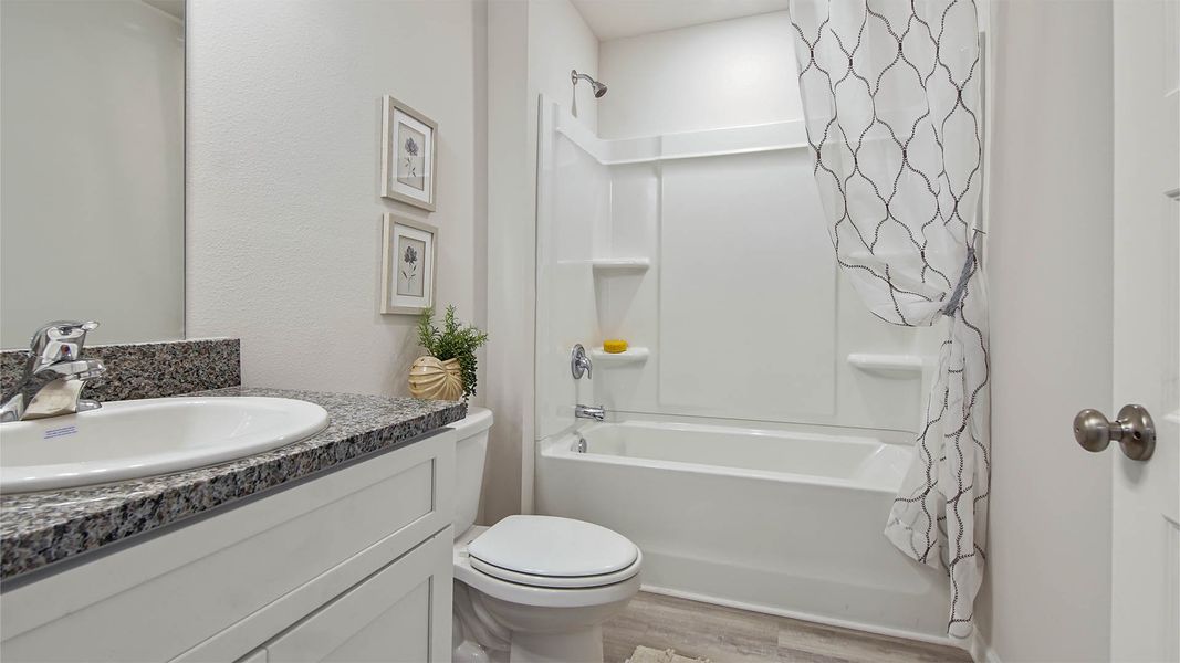 Representative furnished interior of a home built from the Cali by D.R. Horton in Ashton Park Phase III, Freeport (Image 30).