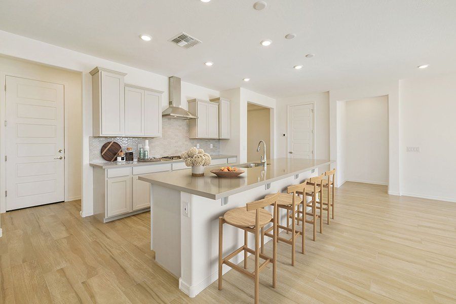 Furnished interior view inside a new home in Windrose V, Waddell (Image 5).