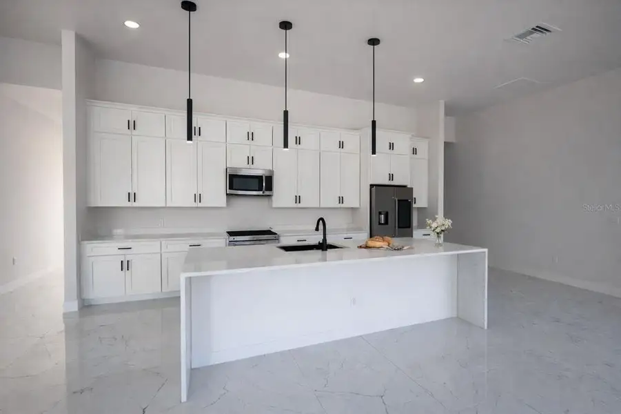 Furnished interior view inside a new home in , Port Charlotte (Image 5).
